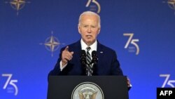 Tổng thống Joe Biden phát biểu tại hội nghị thượng đỉnh kỷ niệm 75 năm thành lập NATO, thủ đô Washington, DC, ngày 9/7/2024. (Photo by SAUL LOEB / AFP)